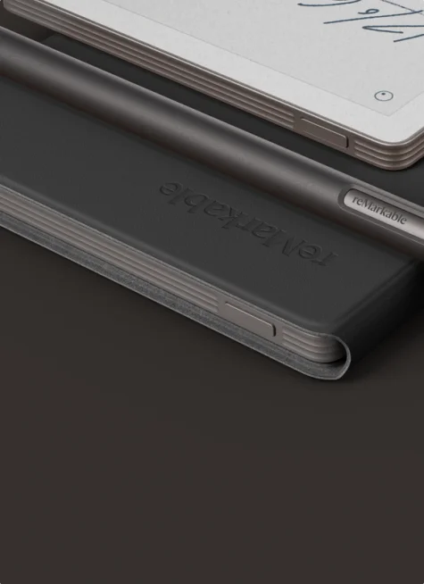 reMarkable Paper Pro Move tablet with Marker and Book Folio in black leather.