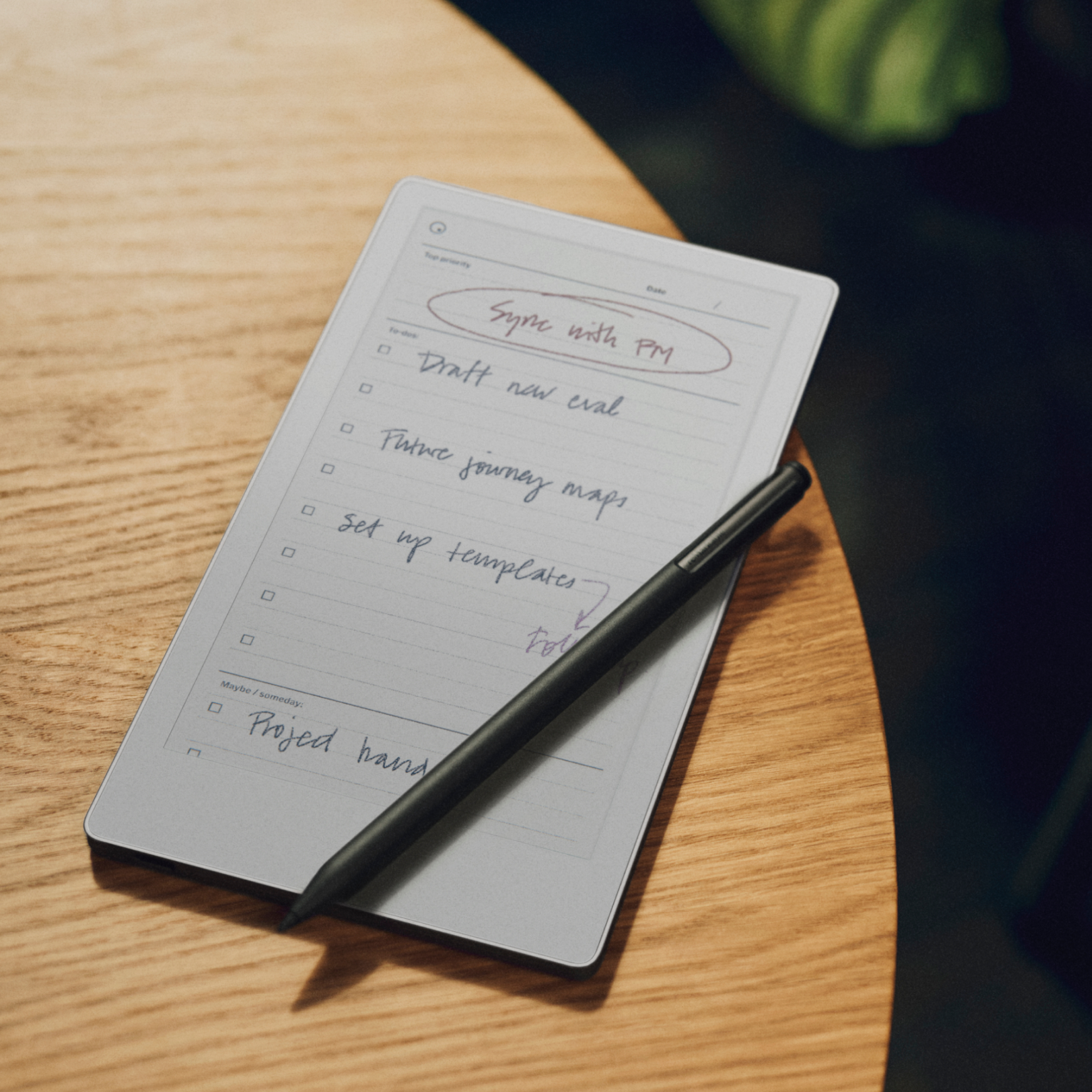 A reMarkable Paper Pro Move displaying a handwritten to-do list with a Marker Plus resting on the screen.