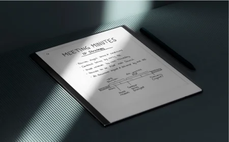 reMarkable paper tablet with notes titled "Meeting Minutes" and a Marker resting on the side.