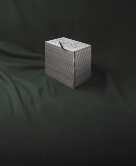 A stack of reMarkable Paper tablets, with a reMarkable Paper Pro with a to-do list on the top.