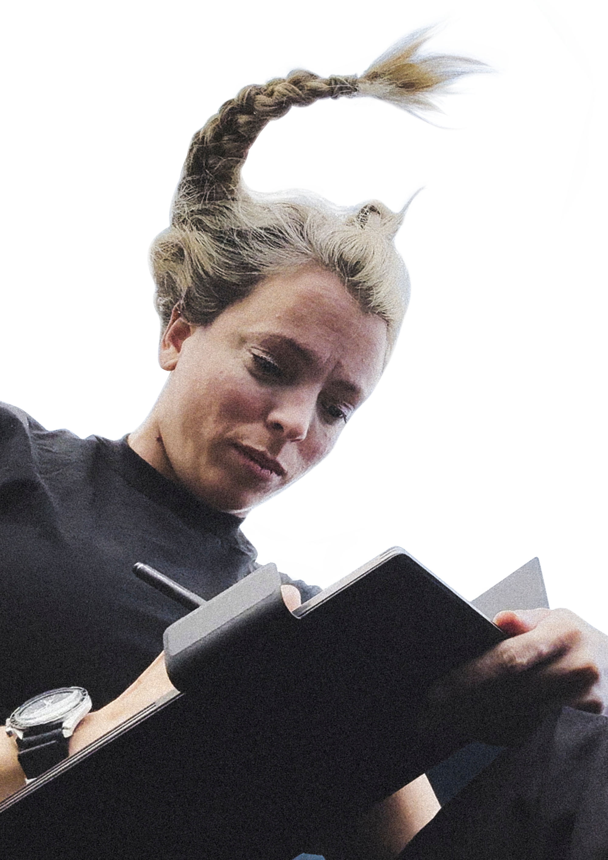 Jannicke Mikkelsen floating in microgravity writing on her reMarkable Paper Pro.