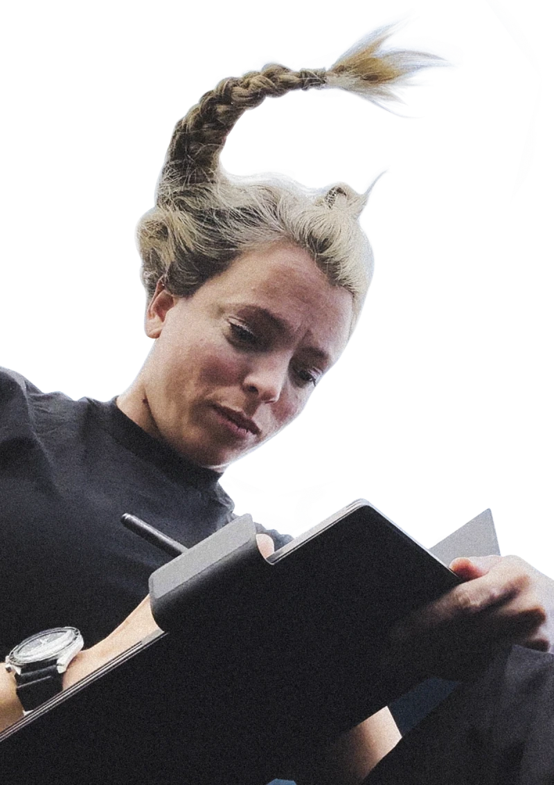 Jannicke Mikkelsen floating in microgravity writing on her reMarkable Paper Pro.