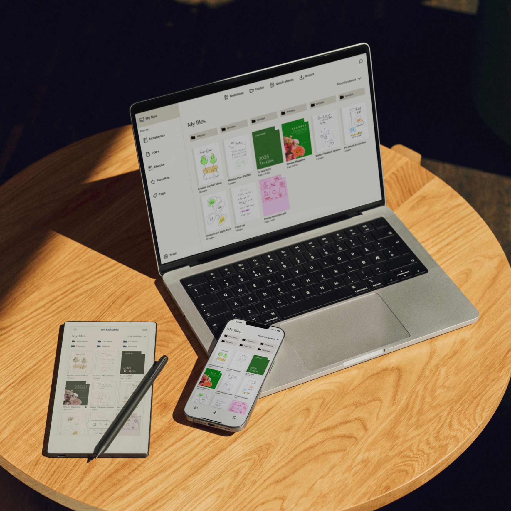 A desktop, mobile and reMarkable device, showing the connected workflow across multiple devices. 