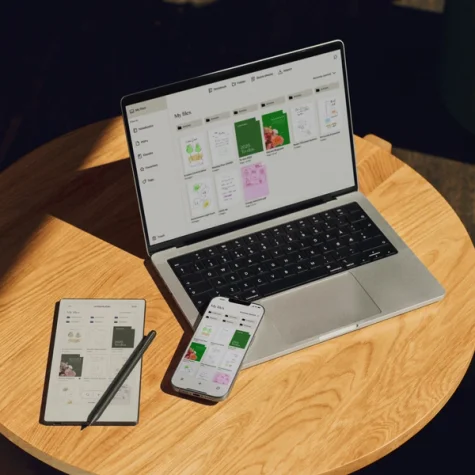 A desktop, mobile and reMarkable device, showing the connected workflow across multiple devices.