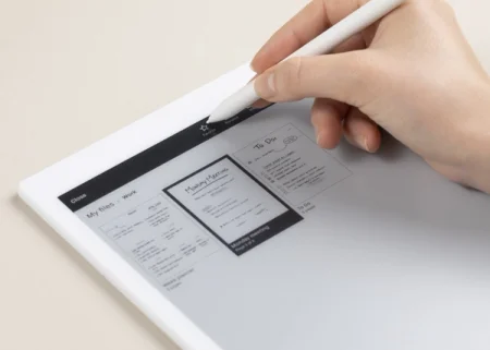 reMarkable paper tablet, being used with the Marker. The screen shows how to add documents to "Favorite".