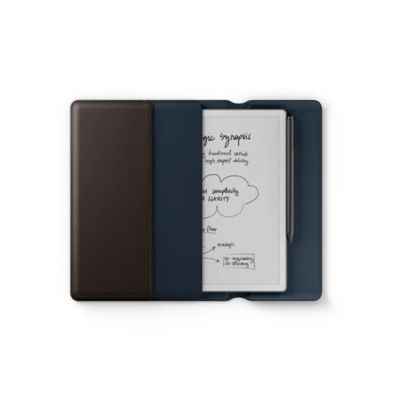Image of the reMarkable Paper Pure half-way out of the Leather Brown Sleeve Folio