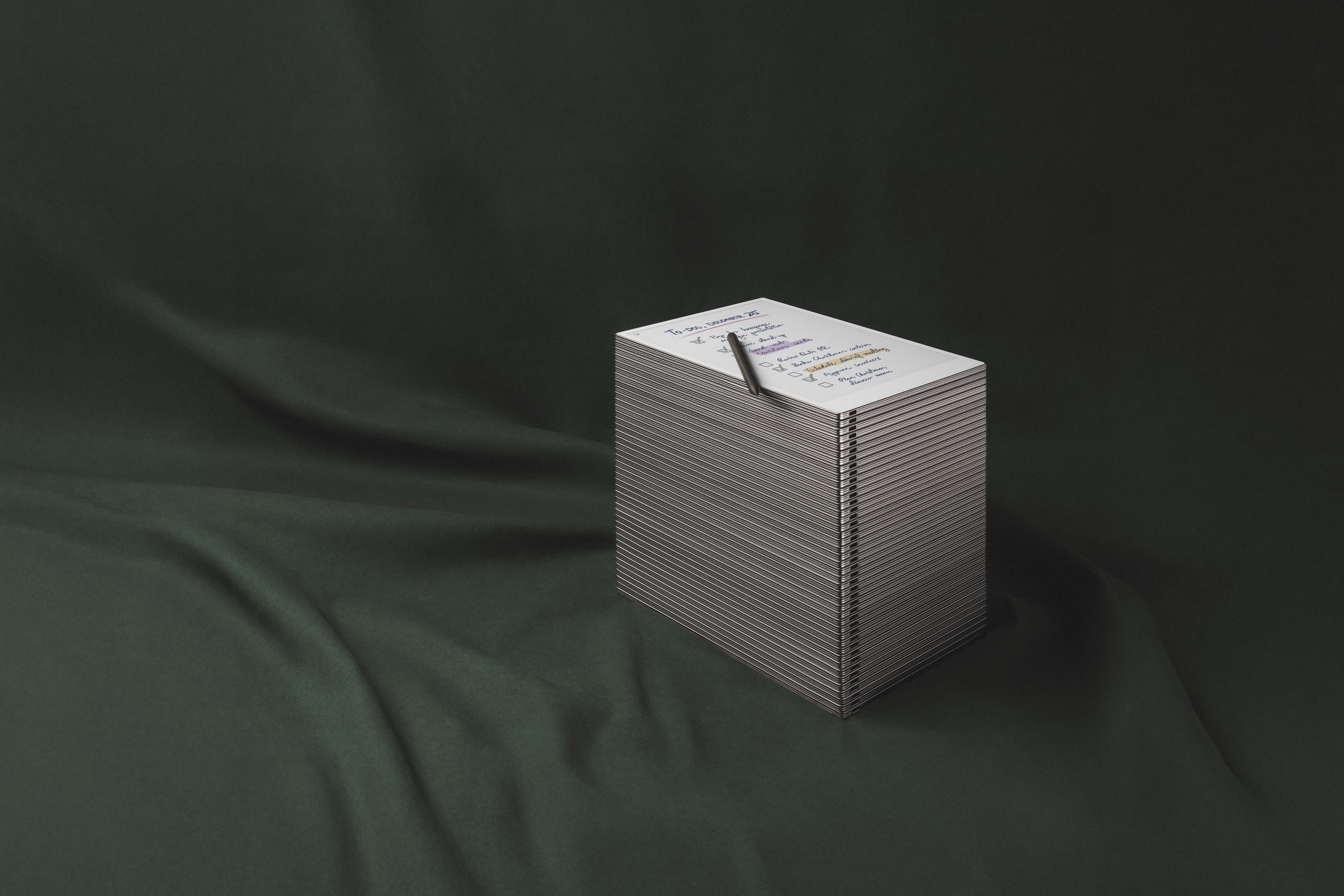 A stack of reMarkable Paper Pro with a to-do list on it.