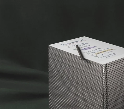 A stack of reMarkable Paper Pro with a to-do list on it.
