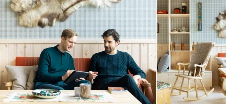 Two reMarkable employees collaborating in a room that looks like a traditional mountain cabin.