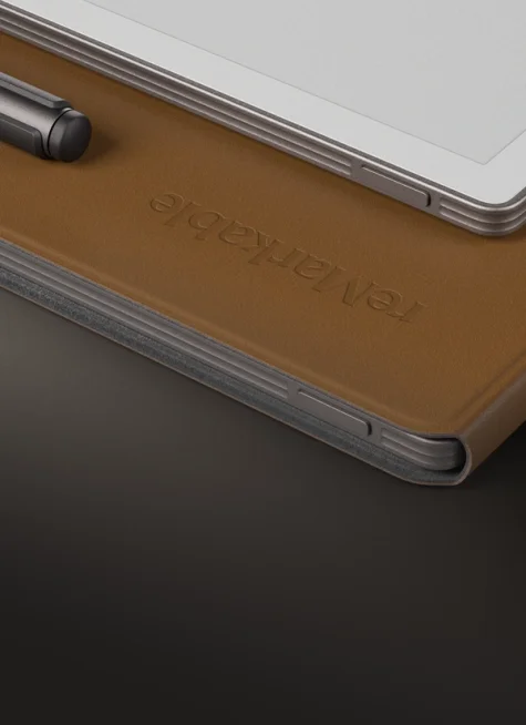Close-up of reMarkable Paper Pro tablet with brown leather Book Folio cover.