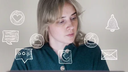 Woman looking at a screen, overlaid with social media notification icons.