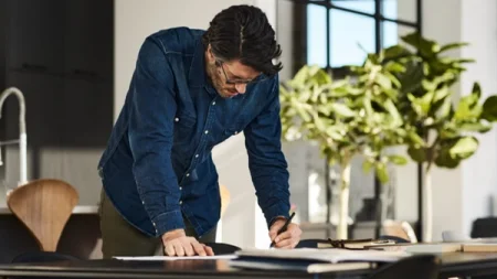 A man writing notes.