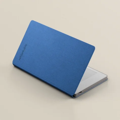 reMarkable Paper Pro Move tablet in a Cobalt color Book Folio cover.