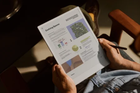 A reMarkable paper tablet displaying a PDF document being annotated with the Marker.