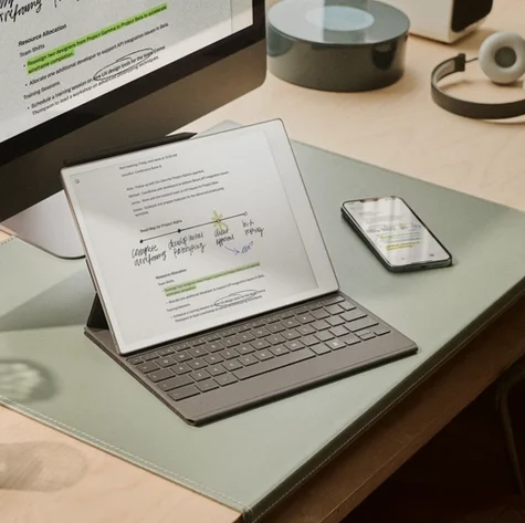 A desk with a PC, a phone and a reMarkable Paper Pro, all syncronized using the reMarkable apps