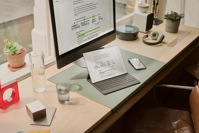 reMarkable paper tablet displaying notes next to a smartphone and a computer.