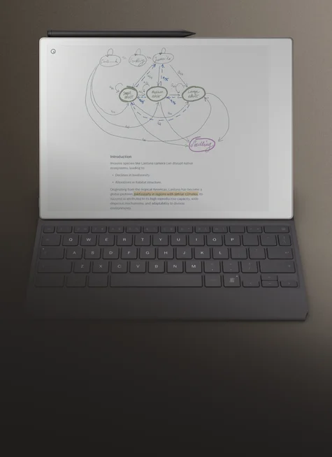 reMarkable Paper Pro tablet upright on a Type Folio, with the Marker resting on top, displaying notes, diagrams and typed text. .