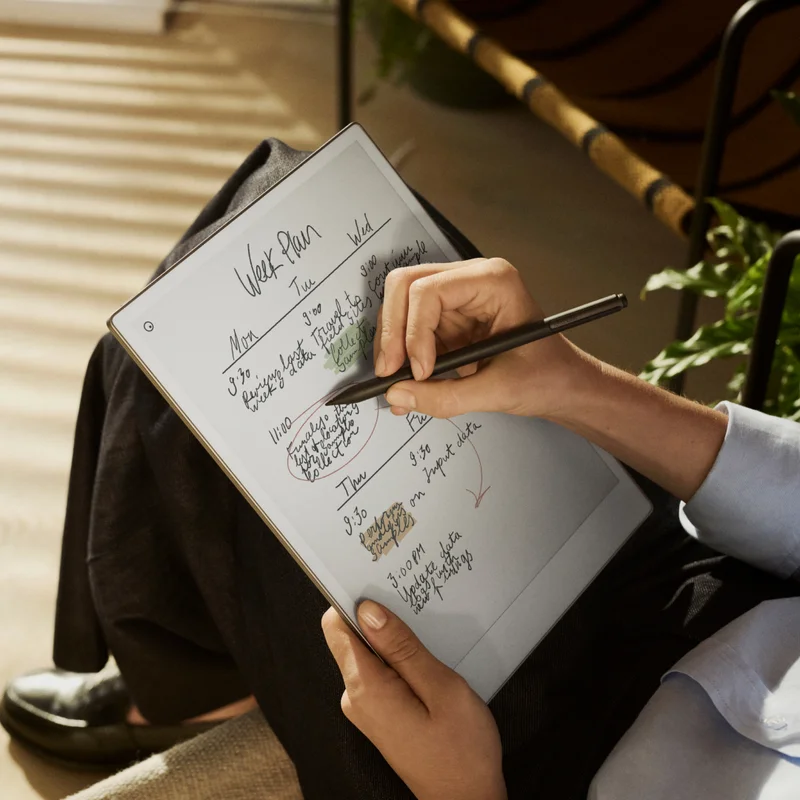 Woman typing on Type Folio for reMarkable Paper Pro