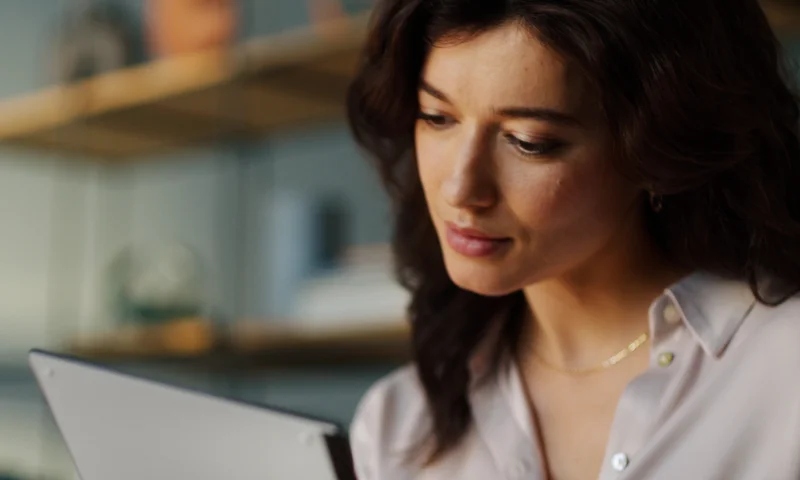 A focused woman working on reMarkable