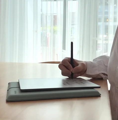 Hazal taking notes on her reMarkable Paper Pure tablet.