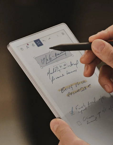 reMarkable Paper Pro Move tablet with on-screen notes being written with the Marker.