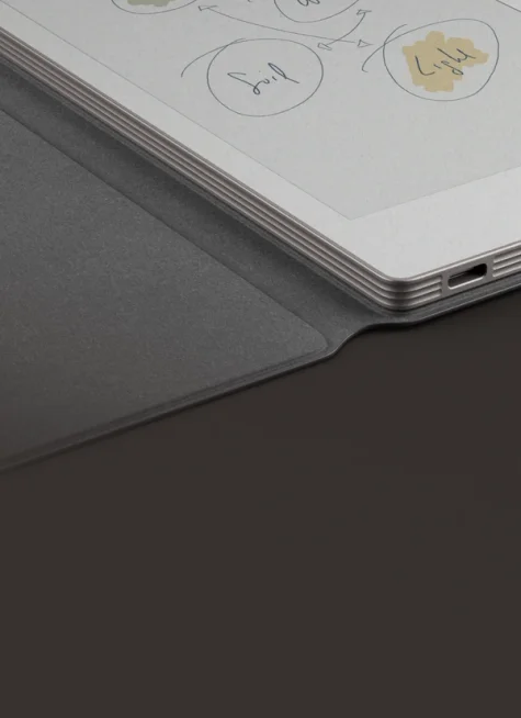 reMarkable Paper Pro Move tablet with notes, in a Book Folio cover.