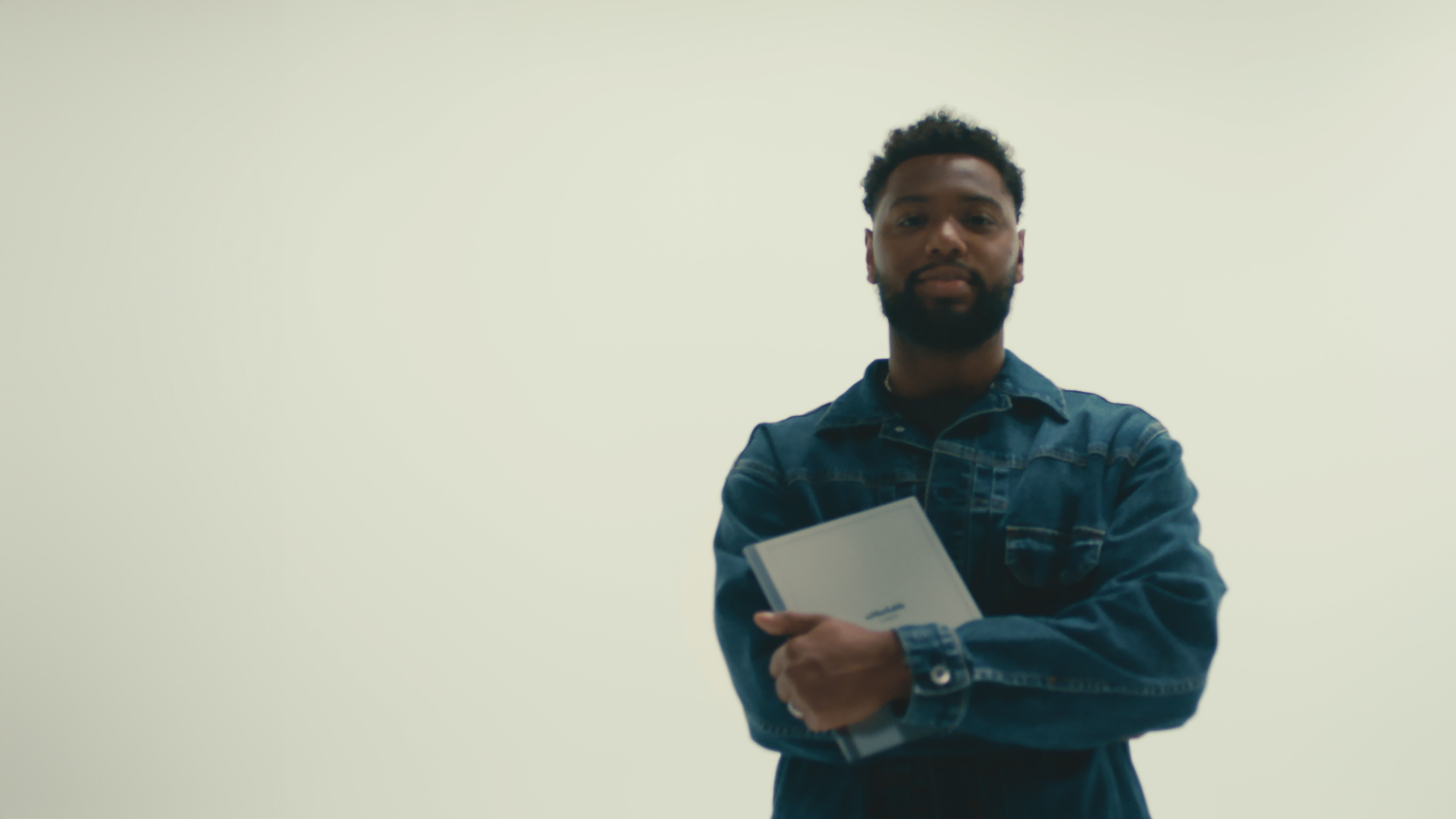 Man standing with reMarkable paper tablet