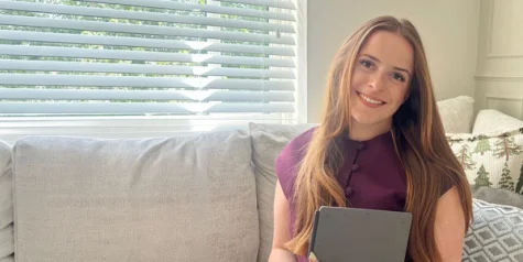A lawyer holding her reMarkable Paper Pure tablet.