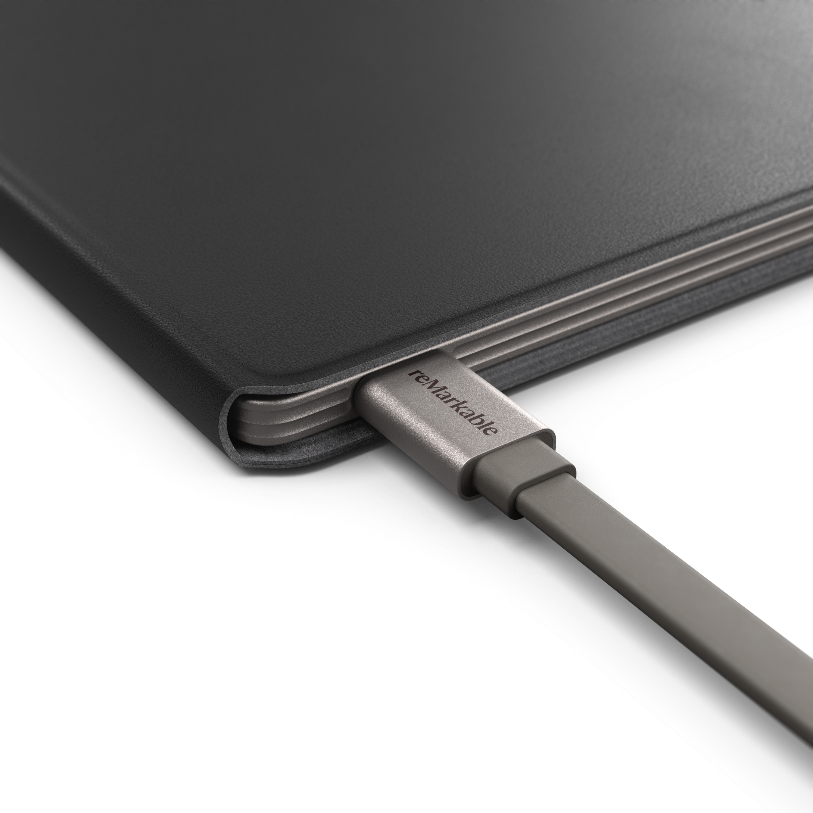 USB-C cable plugged-in to a reMarkable Paper Pro device