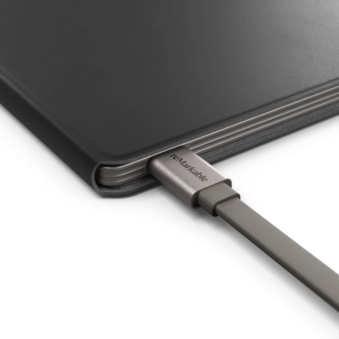 USB-C cable plugged-in to a reMarkable Paper Pro device