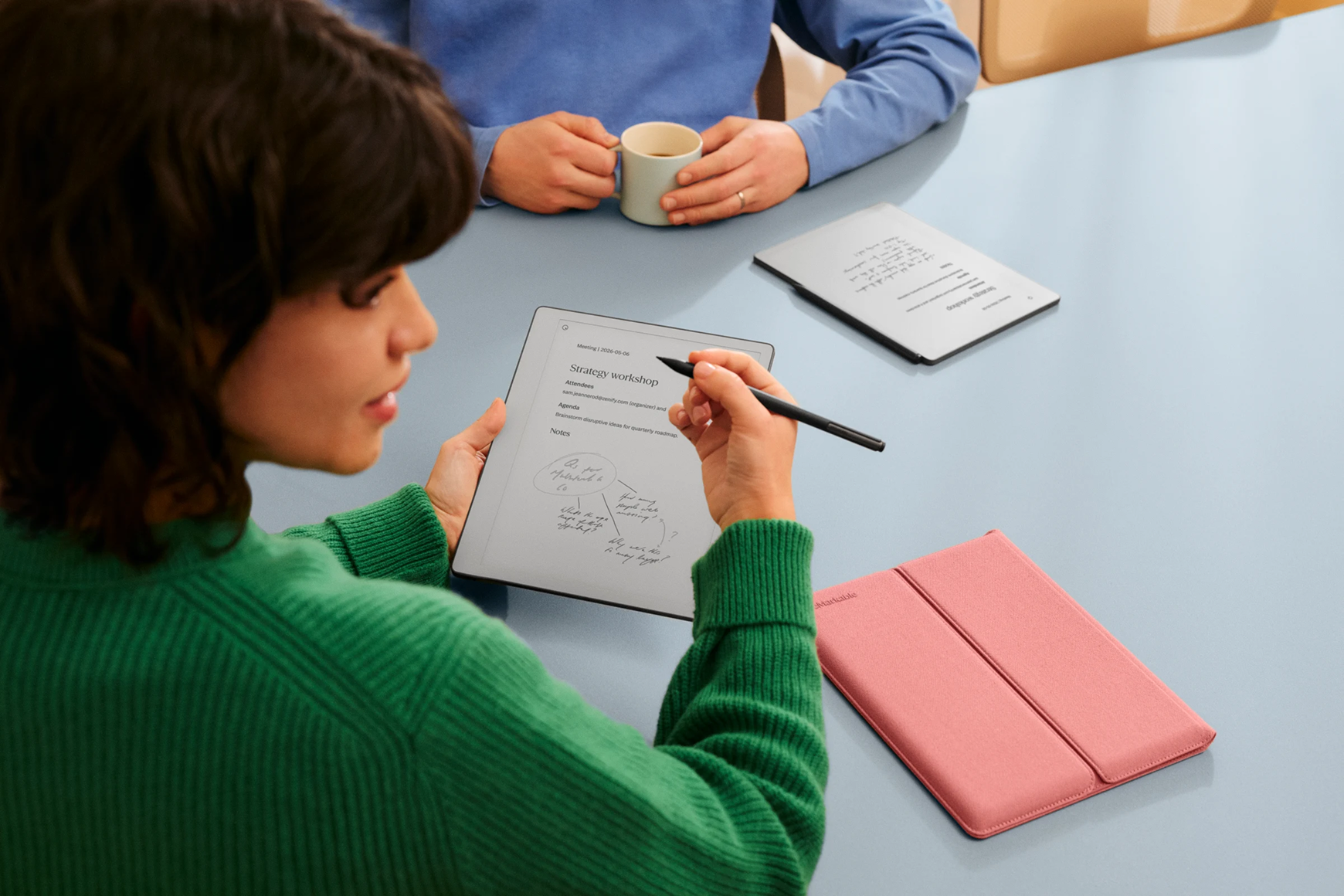 A woman taking notes during a workshop