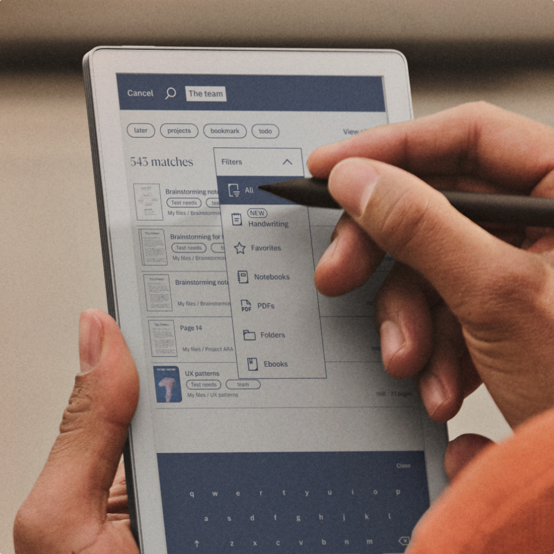 Person filtering the search results of handwritten notes on a reMarkable paper tablet