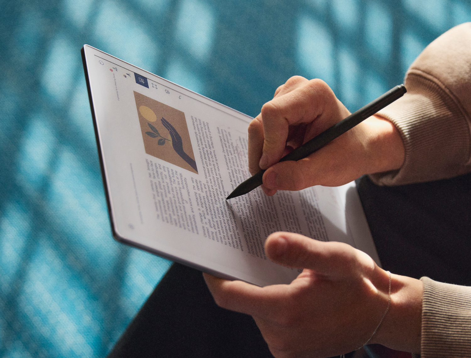A person annotating on a PDF on his reMarkable Paper Pro using a Marker Plus