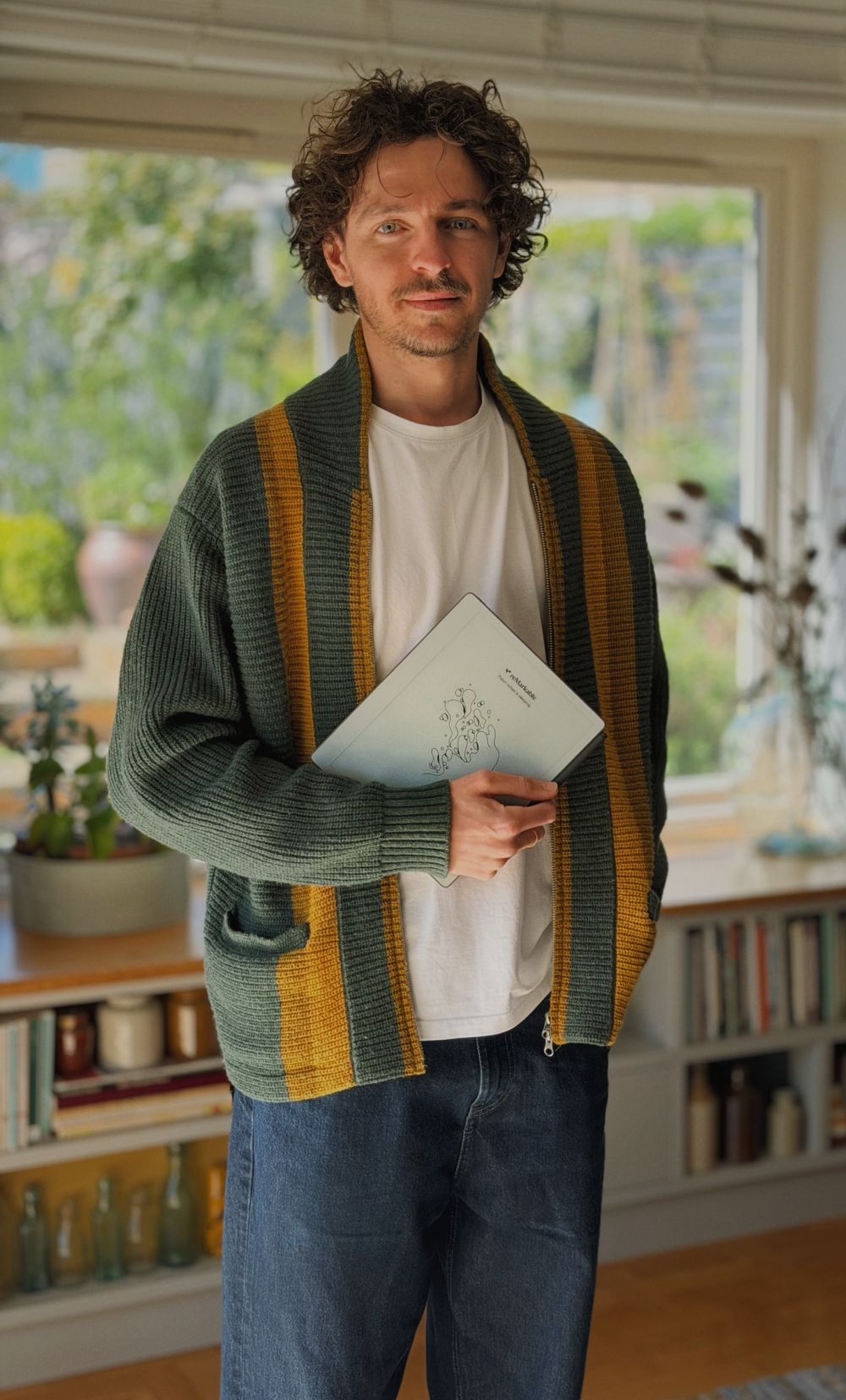 Jack Ogden holding his reMarkable Paper Pure.