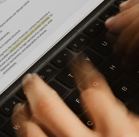 Person writing on his reMarkable Paper Pro using a Type Folio