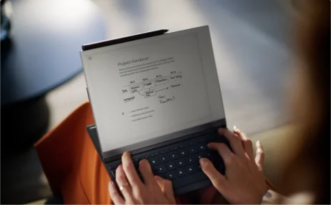 reMarkable 2 tablet being used with Type Folio. Notes visible on the tablet's screen.