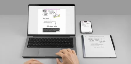 A reMarkable paper tablet next to a laptop and smartphone displaying the same notes.