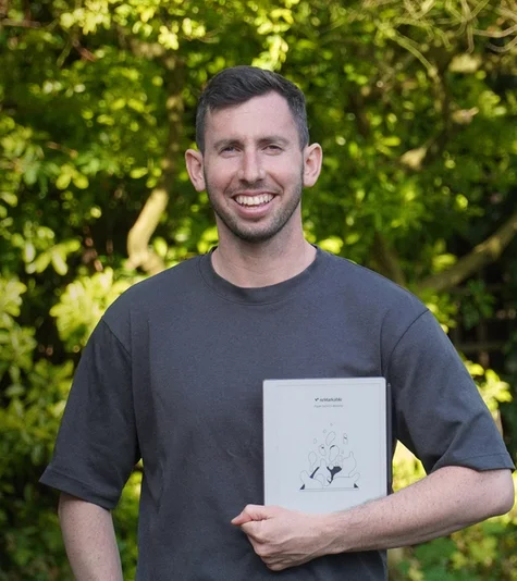Gabriel Nussbaum holding his reMarkable Paper Pure tablet.
