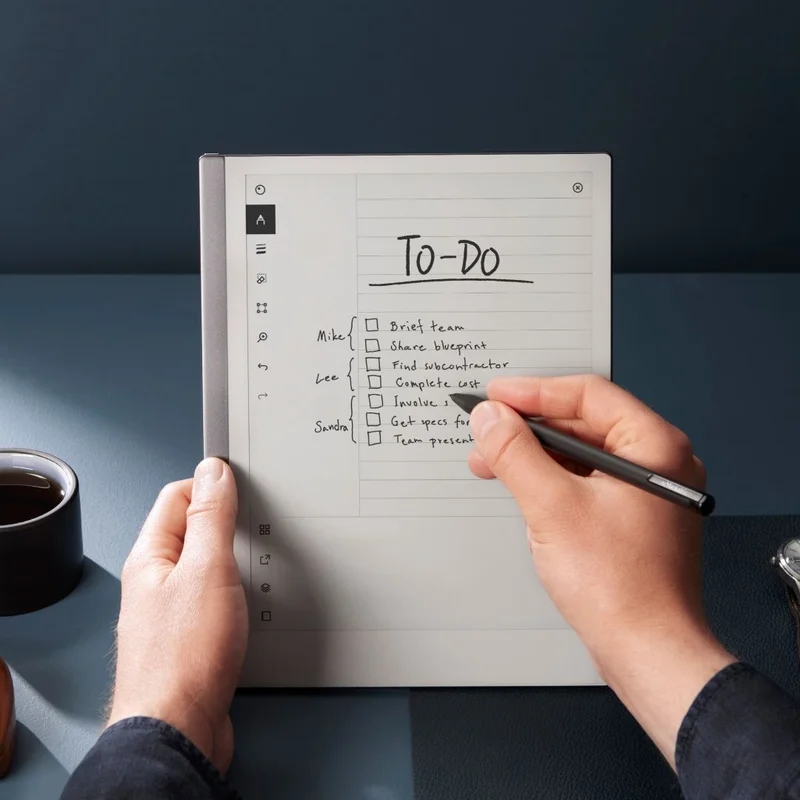 Person holding reMarkable tablet