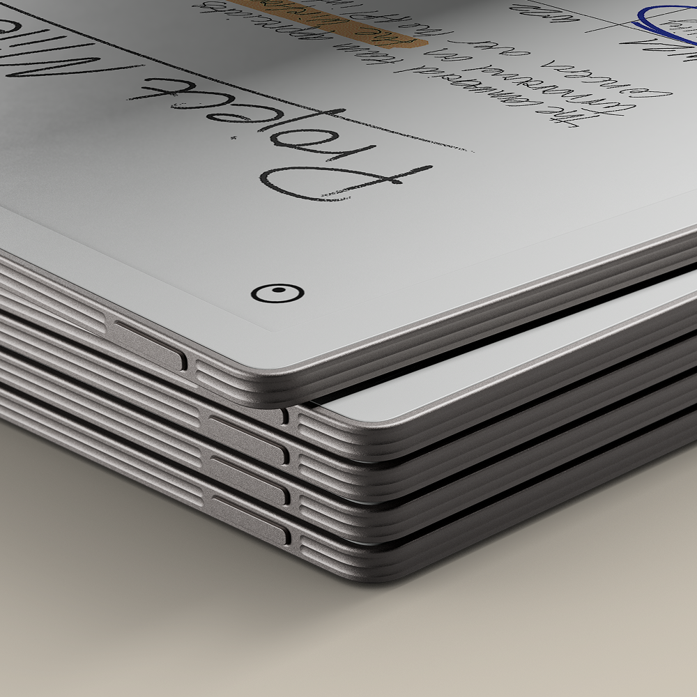 A stack of five reMarkable Paper Pros lying on top of each other