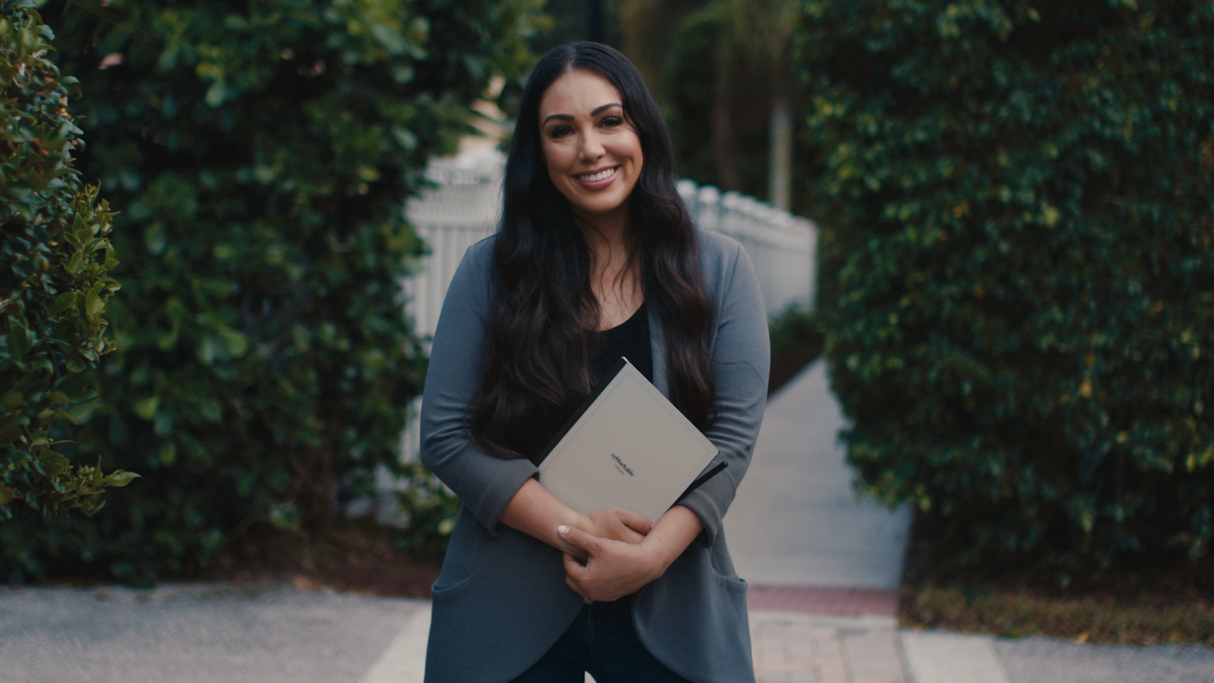 Woman holding reMarkable paper tablet