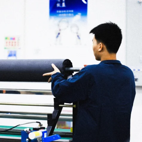 Image of a worker on one of the stations at the factory