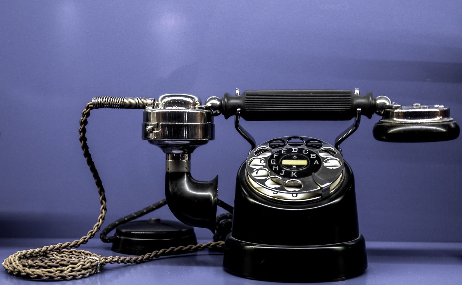 Black rotary telephone