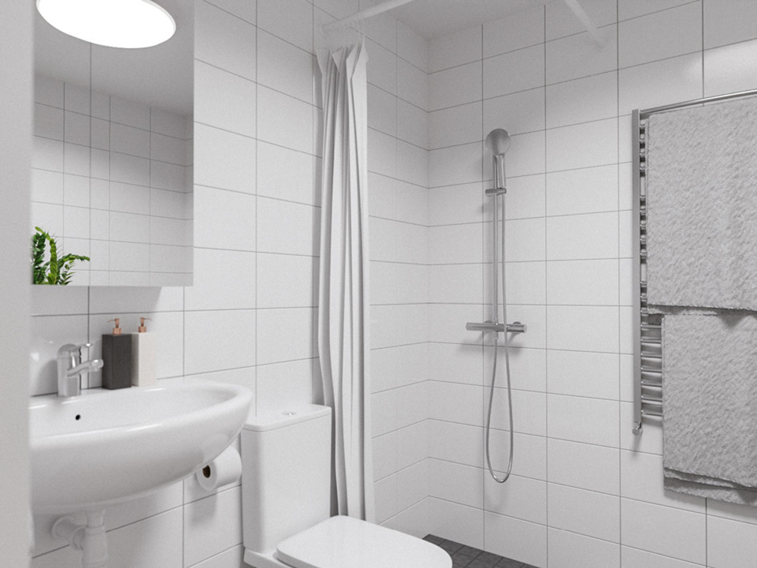 bathroom with a toilet, washbasin and shower.