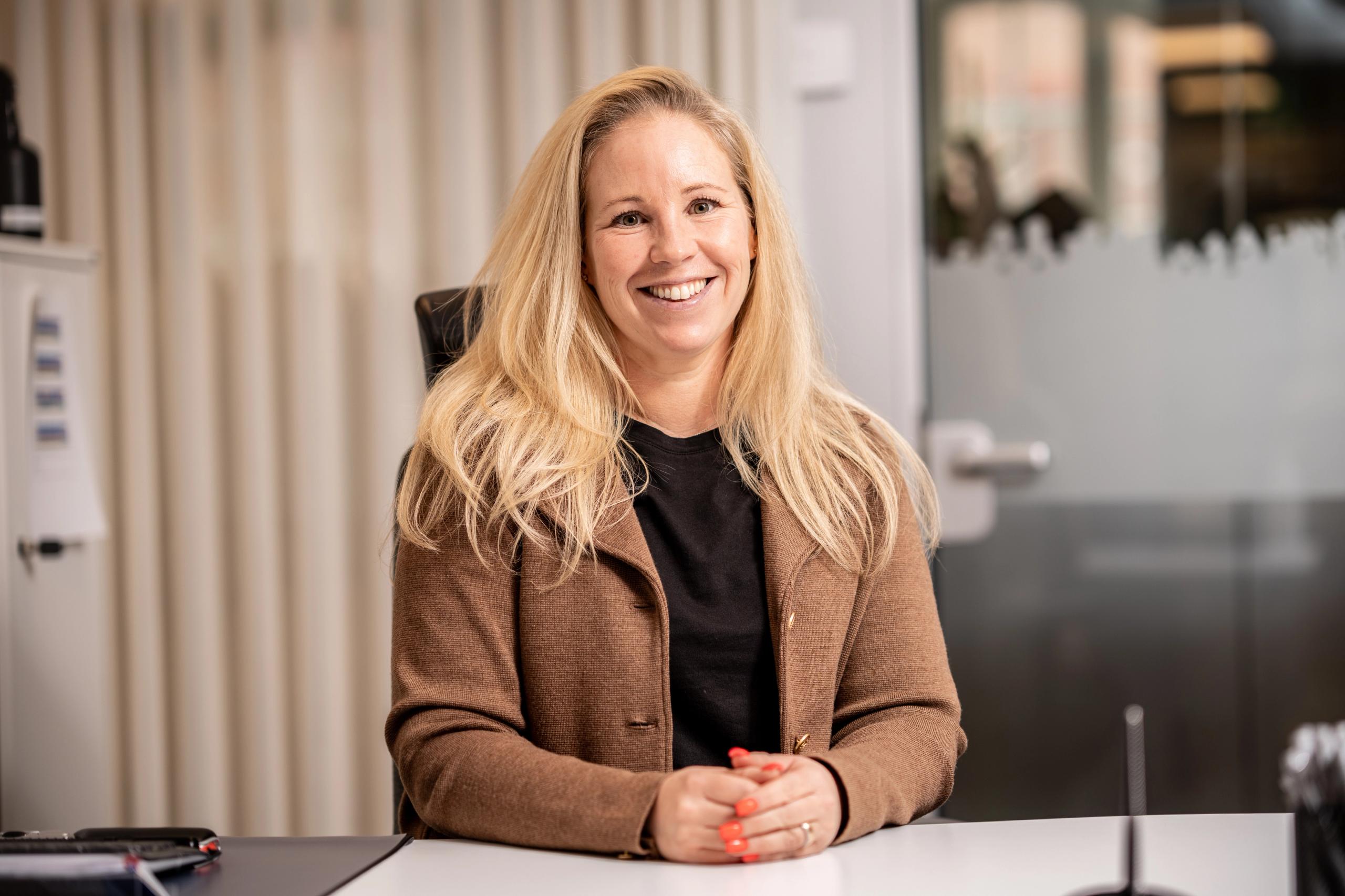 Miriam Carlsson, a member of our customer service team at Bostäder i Borås, at her desk