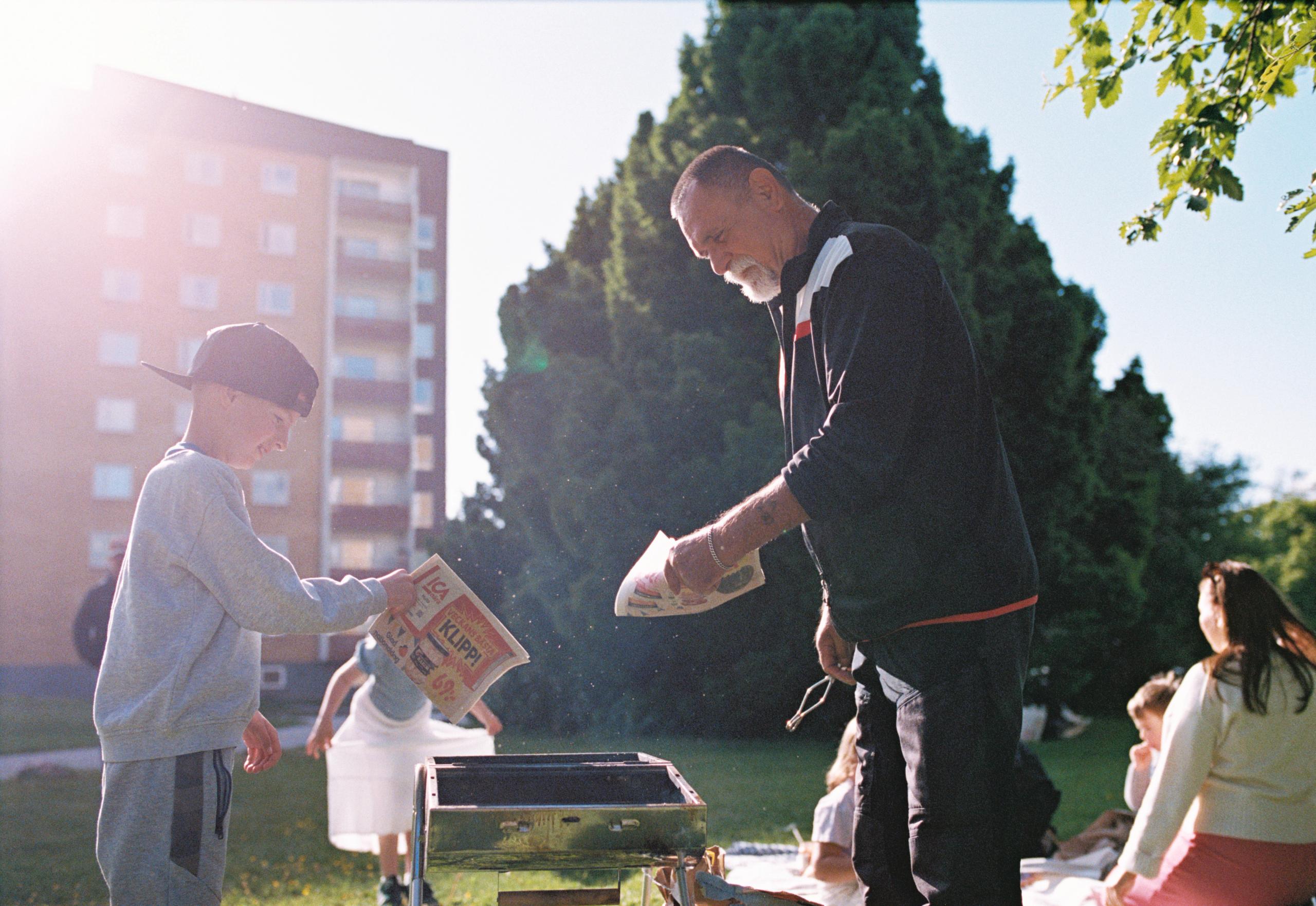 tenants / a family having a barbecue