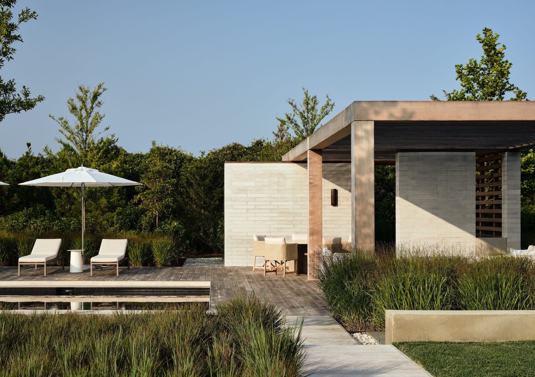 Miroslava-Land-and-Design-Nantucket-Landscape-Architecture-Pocomo-Estate-Outdoor-Pavilion-With-Lounge-Chairs