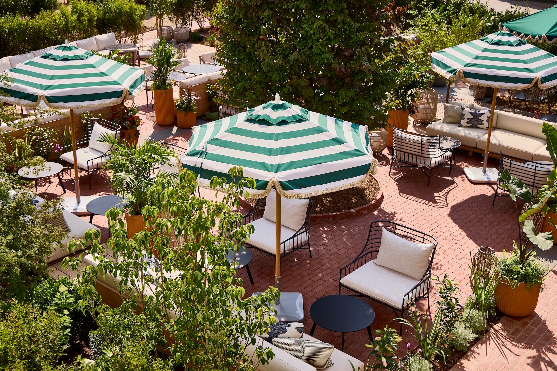 Miroslava-Land-and-Design-Nantucket-Landscape-Architecture-Faraway-Martha's-Vineyard-Garden-Patio-With-Green-Striped-Umbrellas