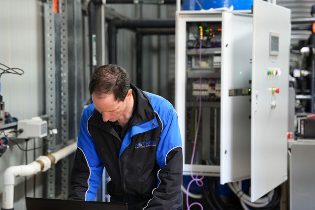 A Metroid technician commissioning an electrical switchboard