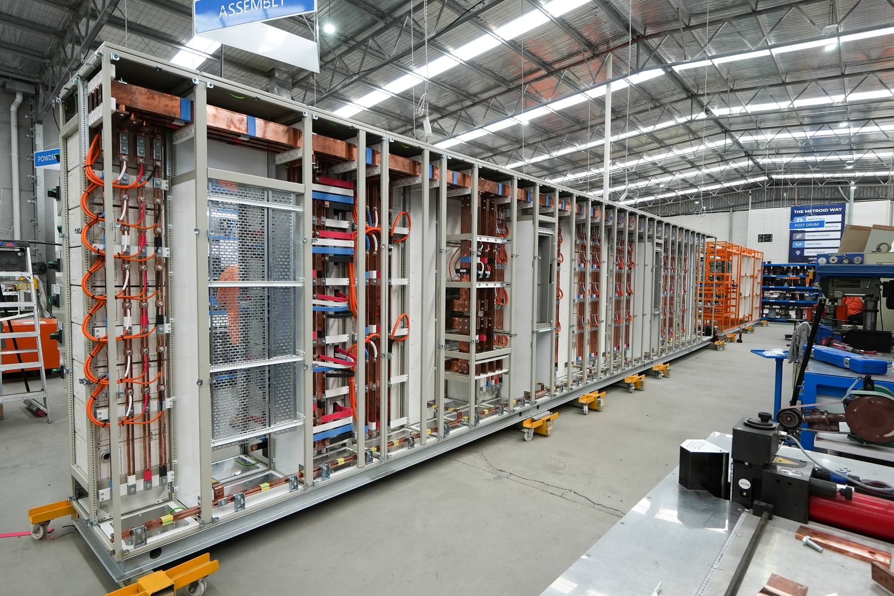 A large electrical switchboard being assembled in the Metroid workshop​​​​‌﻿‍﻿​‍​‍‌‍﻿﻿‌﻿​‍‌‍‍‌‌‍‌﻿‌‍‍‌‌‍﻿‍​‍​‍​﻿‍‍​‍​‍‌﻿​﻿‌‍​‌‌‍﻿‍‌‍‍‌‌﻿‌​‌﻿‍‌​‍﻿‍‌‍‍‌‌‍﻿﻿​‍​‍​‍﻿​​‍​‍‌‍‍​‌﻿​‍‌‍‌‌‌‍‌‍​‍​‍​﻿‍‍​‍​‍‌‍​‌‌‍​‍‌‍​﻿​﻿​‌​﻿​‍​﻿​﻿​‍﻿﻿‌‍‍‌‌‍﻿‍‌﻿‌​‌‍‌‌‌‍﻿‍‌﻿‌​​‍﻿﻿‌‍‌‌‌‍‌​‌‍‍‌‌﻿‌​​‍﻿﻿‌‍﻿‌‌‍﻿﻿‌‍‌​‌‍‌‌​﻿﻿‌‌﻿​​‌﻿​‍‌‍‌‌‌﻿​﻿‌‍‌‌‌‍﻿‍‌﻿‌​‌‍​‌‌﻿‌​‌‍‍‌‌‍﻿﻿‌‍﻿‍​﻿‍﻿‌‍‍‌‌‍‌​​﻿﻿‌‌‍‍​‌‍﻿﻿‌‍﻿‌‌‍‌‌‌‌​​‌‍​‌‌‍‌﻿‌‍‌‌​﻿‍﻿‌﻿‌​‌﻿‍‌‌﻿​​‌‍‌‌​﻿﻿‌‌‍‍​‌‍﻿﻿‌‍﻿‌‌‍‌‌‌‌​​‌‍​‌‌‍‌﻿‌‍‌‌​﻿‍﻿‌﻿​​‌‍​‌‌﻿‌​‌‍‍​​﻿﻿‌‌﻿​​‌﻿​‍‌‍﻿﻿‌‍​﻿‌‍‌‌‌﻿​﻿‌﻿​﻿​‍﻿‍‌‍​‍‌‍​‌‌‍​﻿‌‍‍﻿‌‍‌﻿‌﻿​‍‌‍﻿﻿‌﻿‌‌‌‍﻿‍‌‍‌​‌​‍‌‌‍﻿‌‌‍​‌‌‍‌﻿‌‍‌‌​‍﻿‍‌‍​‌‌‍﻿​‌﻿‌​​﻿﻿﻿‌‍​‍‌‍​‌‌﻿​﻿‌‍‌‌‌‌‌‌‌﻿​‍‌‍﻿​​﻿﻿‌‌‍​‌‌‍​‍‌‍​﻿​﻿​‌​﻿​‍​﻿​﻿​‍‌‍‌‍‍‌‌‍‌​​﻿﻿‌‌‍‍​‌‍﻿﻿‌‍﻿‌‌‍‌‌‌‌​​‌‍​‌‌‍‌﻿‌‍‌‌​‍‌‍‌﻿‌​‌﻿‍‌‌﻿​​‌‍‌‌​﻿﻿‌‌‍‍​‌‍﻿﻿‌‍﻿‌‌‍‌‌‌‌​​‌‍​‌‌‍‌﻿‌‍‌‌​‍‌‍‌﻿​​‌‍​‌‌﻿‌​‌‍‍​​﻿﻿‌‌﻿​​‌﻿​‍‌‍﻿﻿‌‍​﻿‌‍‌‌‌﻿​﻿‌﻿​﻿​‍﻿‍‌‍​‍‌‍​‌‌‍​﻿‌‍‍﻿‌‍‌﻿‌﻿​‍‌‍﻿﻿‌﻿‌‌‌‍﻿‍‌‍‌​‌​‍‌‌‍﻿‌‌‍​‌‌‍‌﻿‌‍‌‌​‍﻿‍‌‍​‌‌‍﻿​‌﻿‌​​‍​‍‌﻿﻿‌